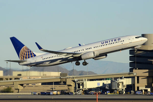 Airplane Poster featuring the photograph United Boeing 737-924 N69810 Phoenix Sky Harbor December 24 2014 by Brian Lockett