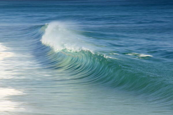 Curling Wave Poster featuring the photograph Curling Wave by Roupen Baker