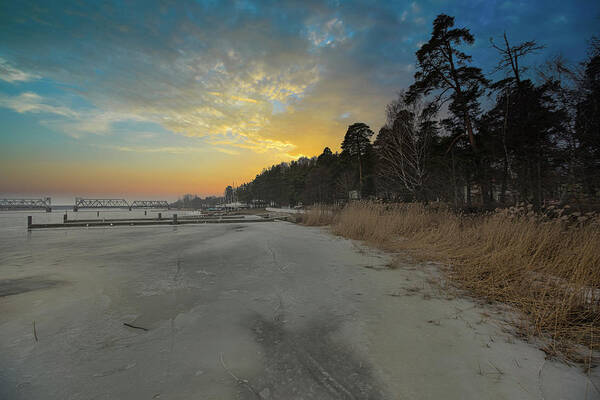 Riverscape Poster featuring the photograph Sunset Riverscape in Winter Haze Jurmala Latvia by Aleksandrs Drozdovs