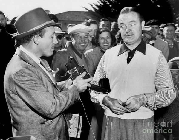 Bing Crosby Poster featuring the photograph Bing Crosby and Bob Hope ham it up at Pebble Beach 1951 by Monterey County Historical Society