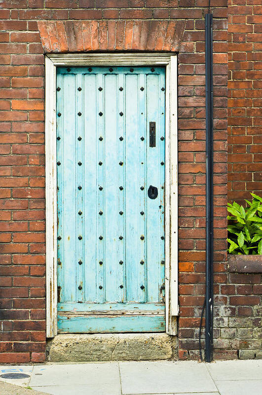 Abstract Poster featuring the photograph Old blue door #1 by Tom Gowanlock