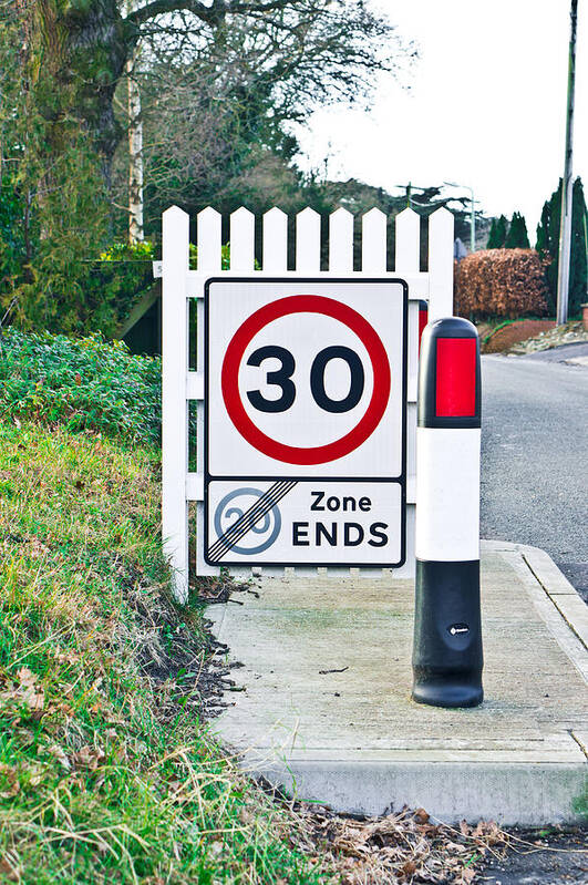 Asphalt Poster featuring the photograph Speed limit #1 by Tom Gowanlock