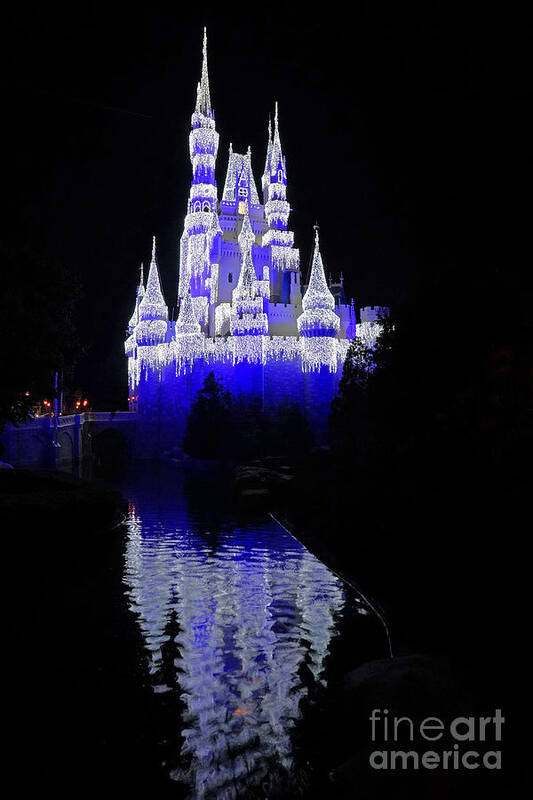 Walt Disney World Cinderella Castle Orlando Florida Lights Christmas Magic Kingdom Water Reflection Poster featuring the photograph Cinderella Castle #2 by AK Photography