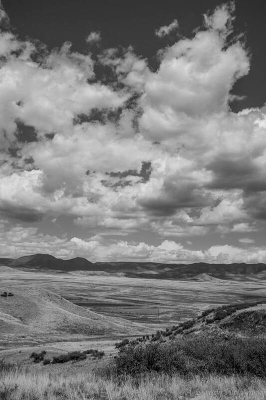 Cumulus Clouds Poster featuring the photograph Black and White High Desert Cumulus by Aaron Burrows