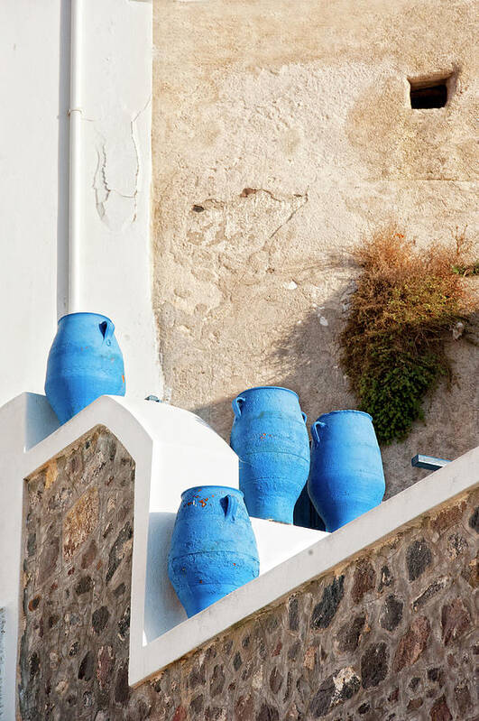 Tranquility Poster featuring the photograph Blue Clay Pots In The Sun Of Fira by Ralucahphotography.ro