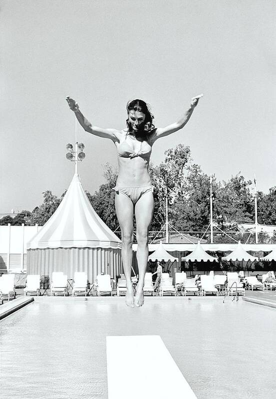 Personality Poster featuring the photograph Donna Garrett Jumping On Diving Board by William Connors
