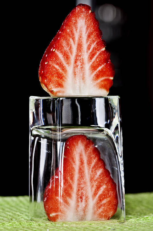 Fruit Poster featuring the photograph Strawberry on ice - Fire on ice by Pedro Cardona Llambias