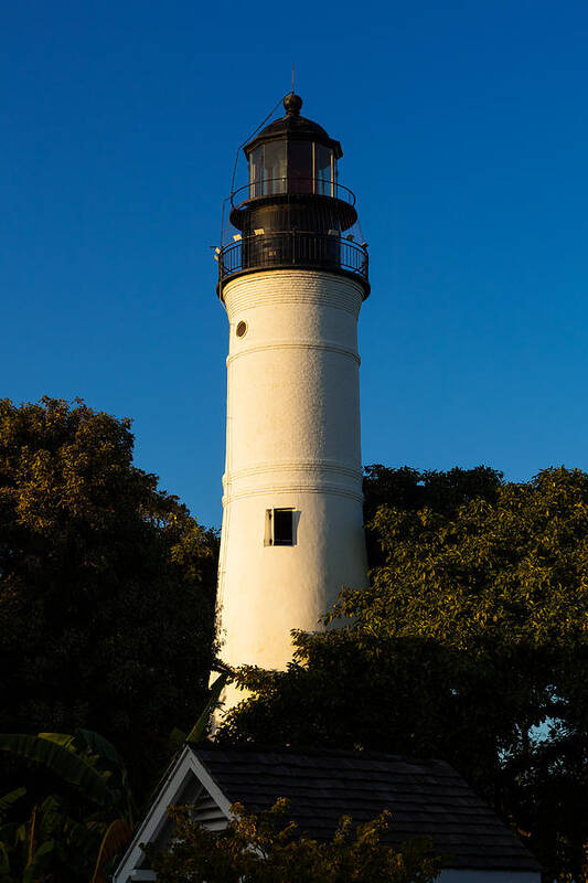 Aid Poster featuring the photograph Key West Lighthouse at Sundown by Ed Gleichman