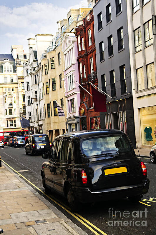 London Poster featuring the photograph London taxi on shopping street by Elena Elisseeva