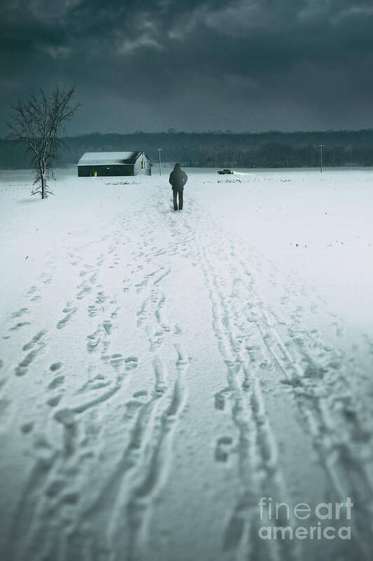 Alone Poster featuring the photograph Man walking in the distance towards a barn by Sandra Cunningham