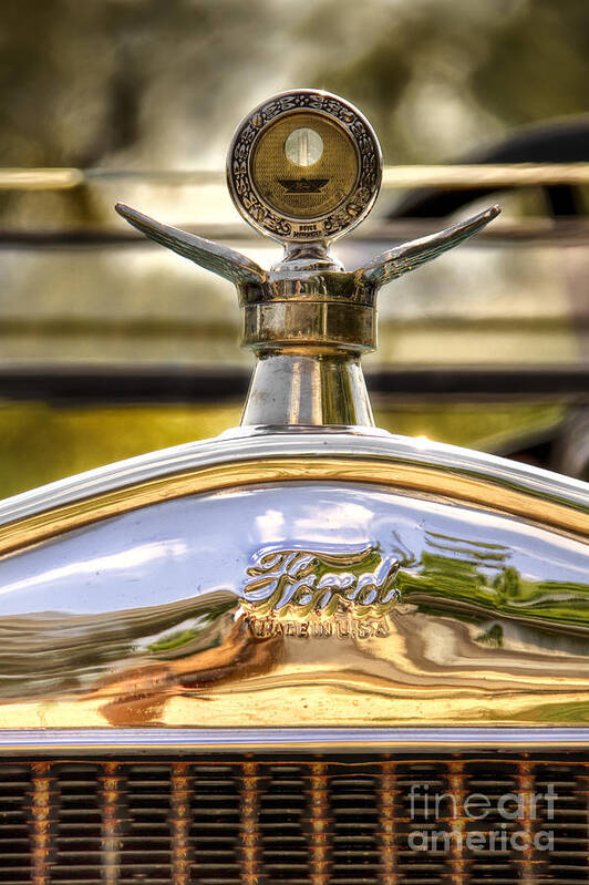 Ford; Car; Detail; Ornament; Hood; Chrome; Auto; Automobile; Transportation; Decor; Rust; Reflection; Close Up; Model T; 1920s; Vintage; Shiny; Glare; Antique; Turn Of The Century; Early 1900s; 20s; Vehicle Poster featuring the photograph Model T by Margie Hurwich