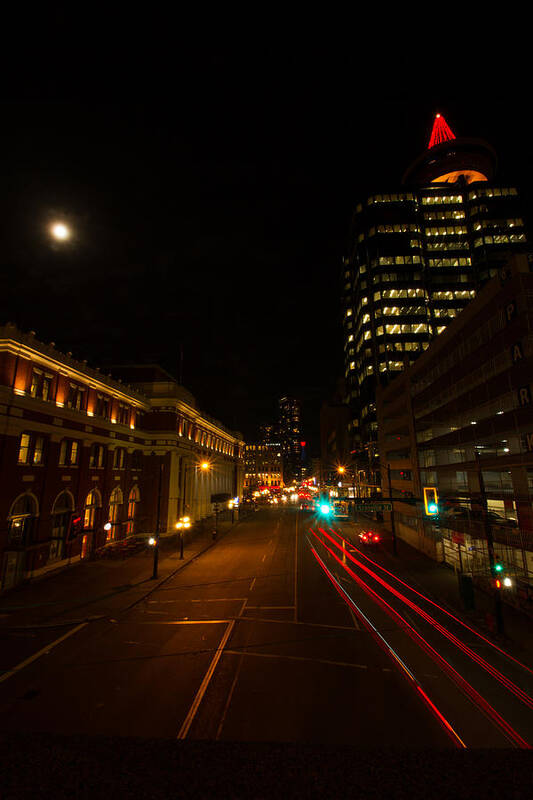 Vancouver Poster featuring the photograph Moonlight over the city by Haren Images- Kriss Haren
