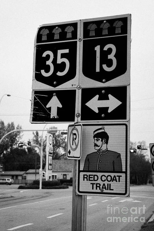 Red Poster featuring the photograph red coat trail highway 35 weyburn Saskatchewan Canada by Joe Fox