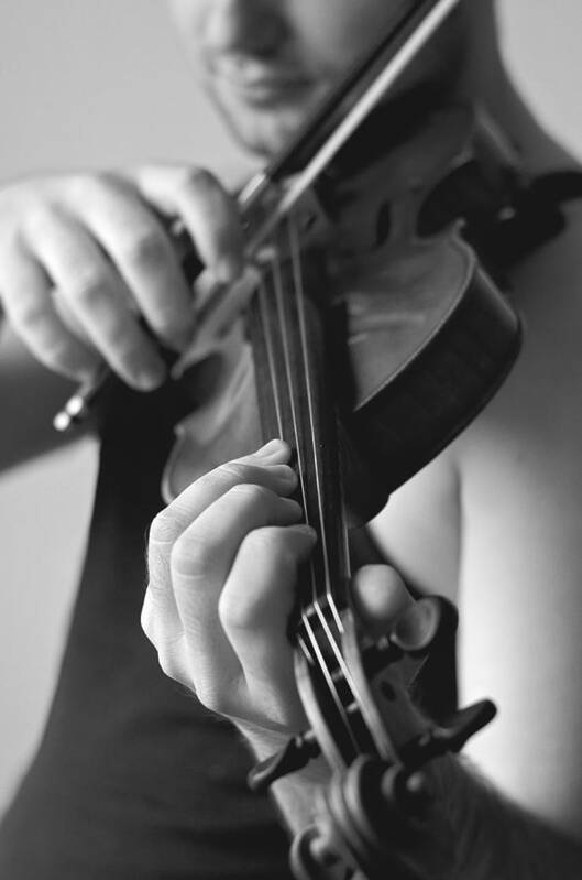 Violin Poster featuring the photograph The Violonist by Urte Berteskaite
