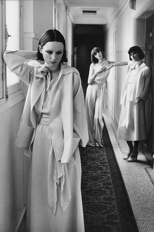Designer Poster featuring the photograph Three Models In A Hallway Inside Hotel Lutetia by Deborah Turbeville