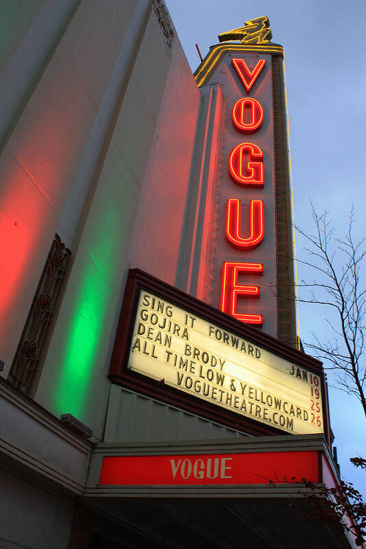 Neon Signs Poster featuring the photograph Vogue Theatre by Gerry Bates