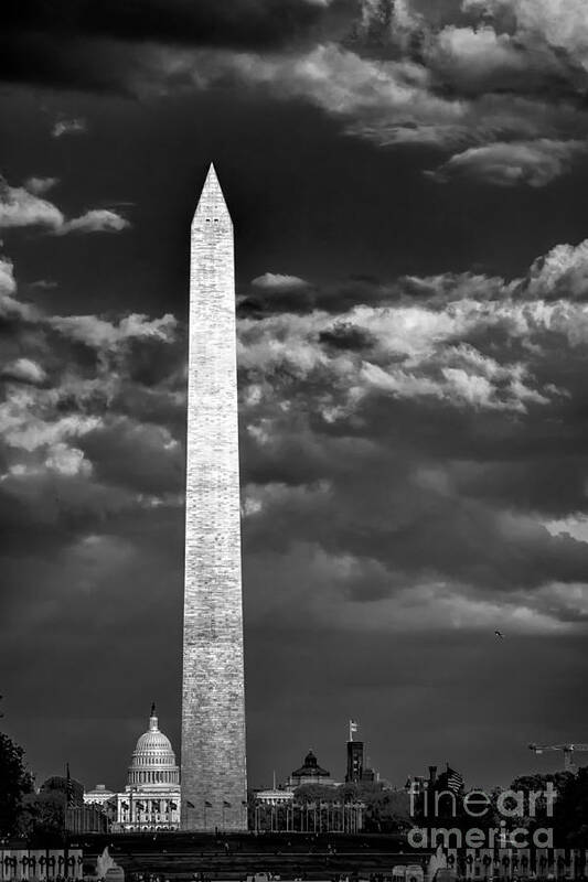 Washington Dc Poster featuring the photograph Washington Monument in cloudy sky by Izet Kapetanovic