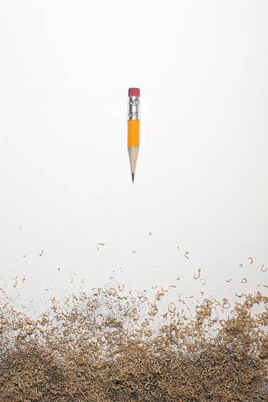 White Background Poster featuring the photograph Worn Down Pencil With Shaving by Chris Parsons