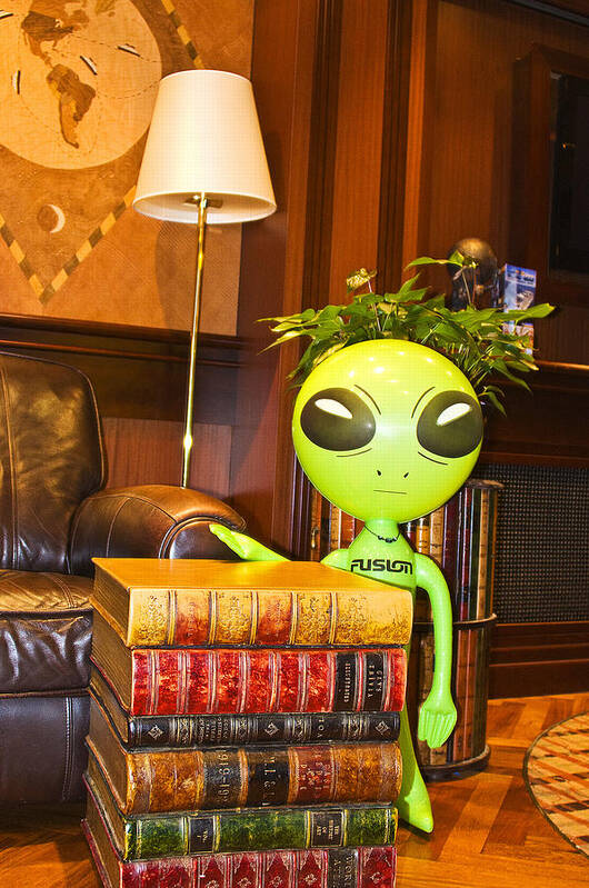 Alien Poster featuring the photograph Bookworm Alien by Richard Henne