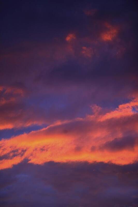 Atmospheric Poster featuring the photograph Clouds In Sky With Pink Glow by Richard Wear