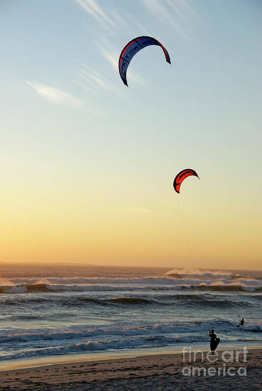 South African Poster featuring the photograph Kite surfers on beach at sunset by Sami Sarkis