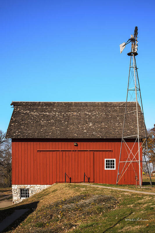 Barns Poster featuring the photograph Red Barn And Windmill by Ed Peterson