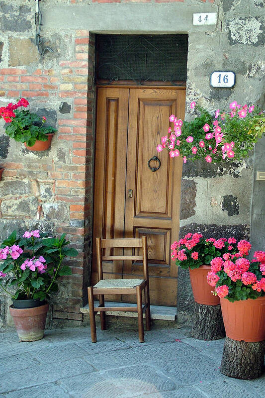 Tuscany Poster featuring the photograph Uneven Tuscan Doorway by Donna Corless