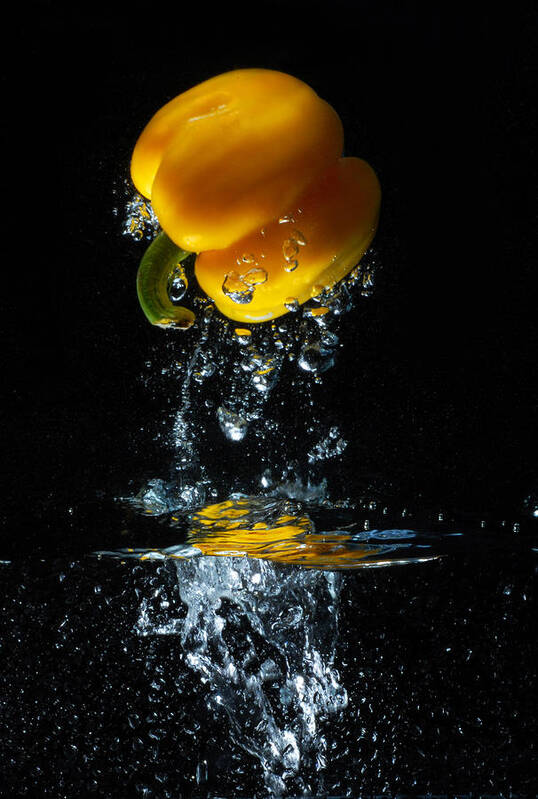 Pepper Poster featuring the photograph Yellow pepper escapes from water by Dung Ma