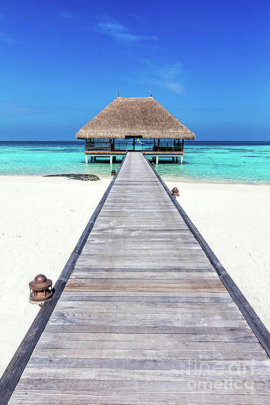 Maldives Poster featuring the photograph Wooden jetty leading to relaxation lodge. Maldives islands #1 by Michal Bednarek