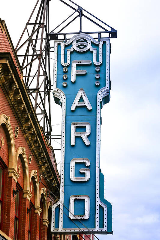 Fargo; Cinema; Blue; Overhead; Sign; City; Theater; Movie-house; Big; Screen; Film; Flicks; Motion; Pictures; Movies; Theater; Picture-show; Playhouse; Silver-screen; Centre; Performing; Arts; Hall; Locale; Site; Entertainment; Attraction; Recreation; Leisure; Lifestyles; Building; Architecture; Landmark; Nd; North; Dakota; America; Usa; Poster featuring the photograph Fargo Blue Theater Sign by Chris Smith
