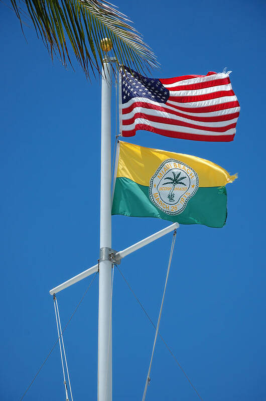 Flag Poster featuring the photograph Flags at Beach Patrol HQ - Miami by Frank Mari