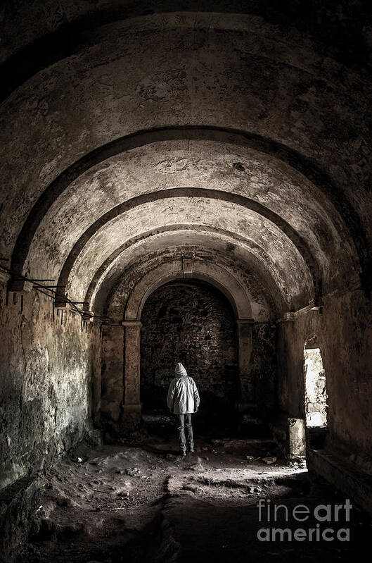Atmospheric Poster featuring the photograph Man inside a ruined chapel by Carlos Caetano