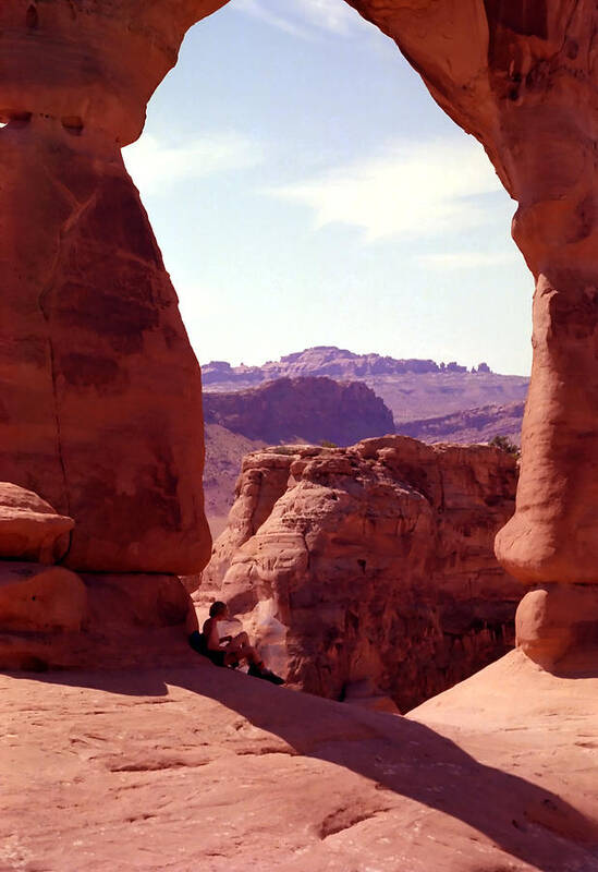 Arch Poster featuring the photograph Man Resting Under Arch by Steve Ohlsen