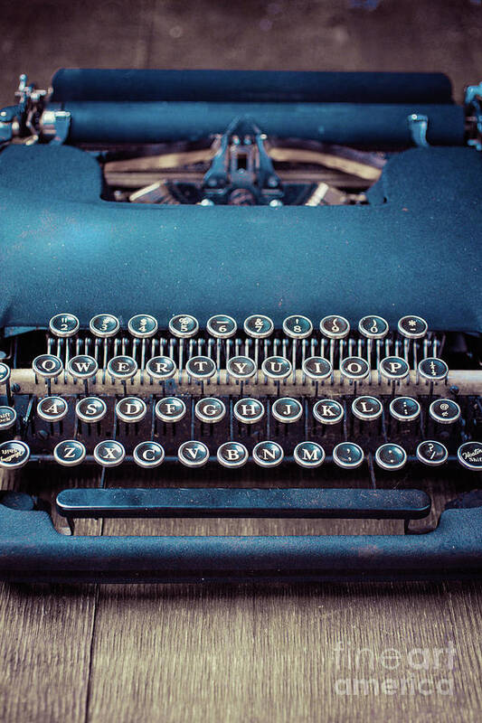 Still Life Poster featuring the photograph Old blue typewriter by Edward Fielding