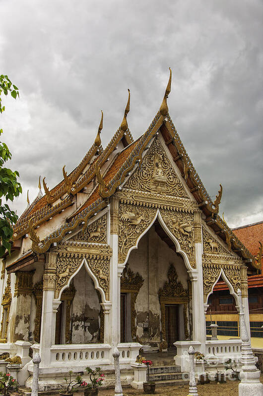 Phetchaburi Poster featuring the photograph Phetchaburi Temple with moody sky by Antony McAulay