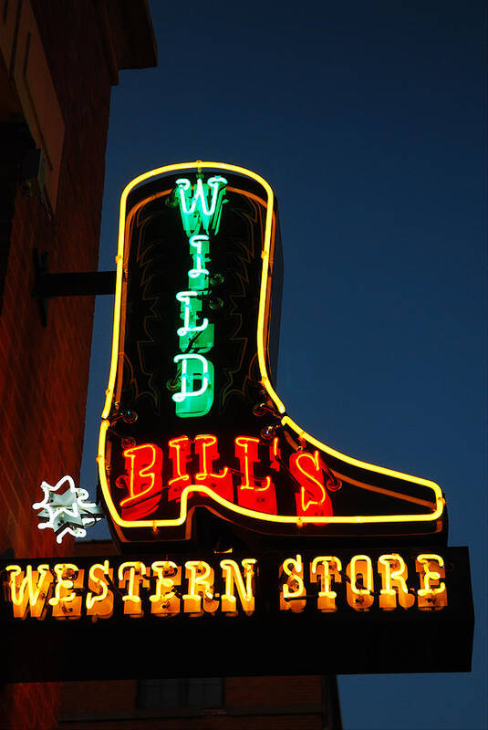 Wild Poster featuring the photograph Wild Bills Western Store by James Kirkikis