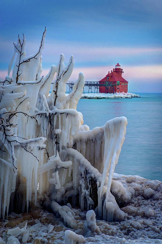 #wisconsin #outdoor #fineart #landscape #photograph #wisconsinbeauty #doorcounty #doorcountybeauty #sony #canonfdglass #beautyofnature #history #metalman #passionformonotone #homeandofficedecor #streamingmedia #lighthouse #sunset #icecovered #encrusted #lakemichigan #catwalk Clouds #shipping #calm Poster featuring the photograph Winter Lighthouse by David Heilman