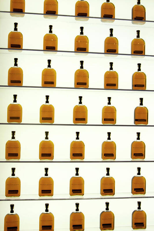 American Poster featuring the photograph Woodford Reserve Visitors Center bottle display by Karen Foley