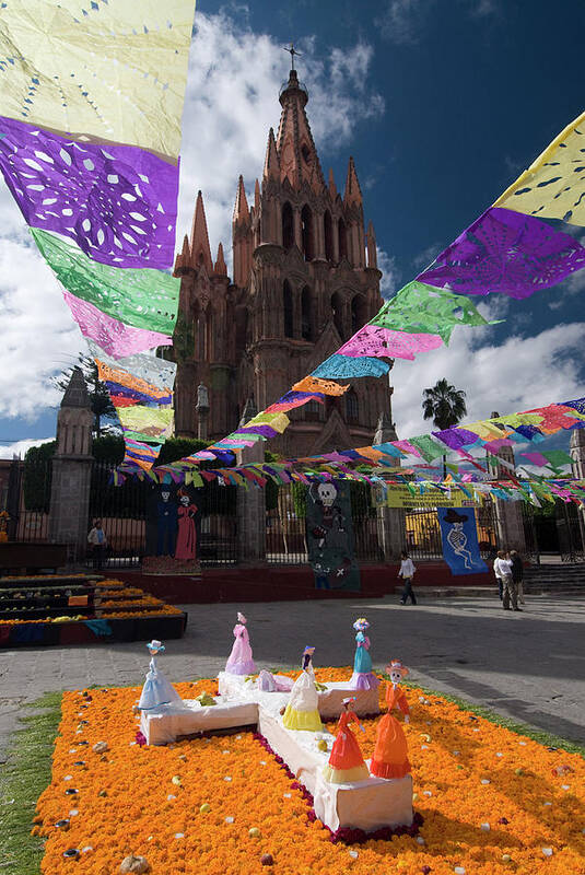 Decorations For The Day Of The Dead Festival With Parroquia De San Miguel Arcangel In The Background Poster featuring the photograph 801-119 by Robert Harding Picture Library