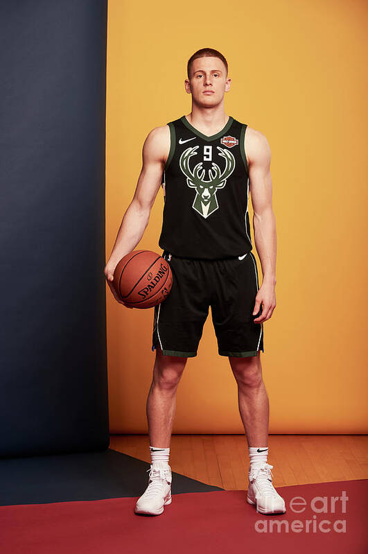Donte Divencenzo Poster featuring the photograph 2018 Nba Rookie Photo Shoot #87 by Jennifer Pottheiser