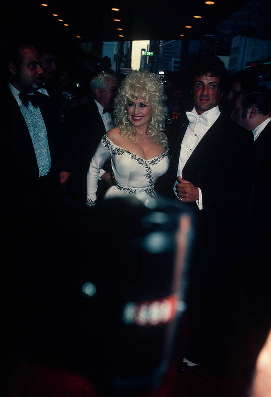 Vertical Poster featuring the photograph Dolly Parton And Sylvester Stallone by Art Zelin