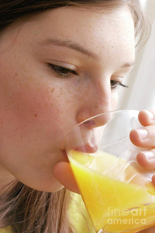 Orange Juice Poster featuring the photograph Girl Drinking Orange Juice by Aj Photo/science Photo Library