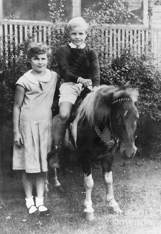 Child Poster featuring the photograph Marlon Brando On Pony And Sister Jocelyn by Bettmann