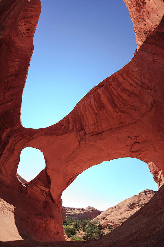 Tranquility Poster featuring the photograph Natural Arches Rock Formations by Michele Falzone