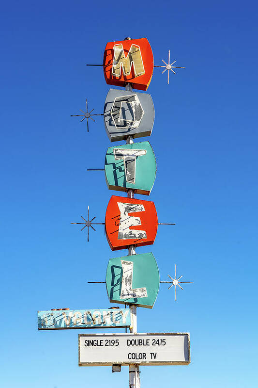 Neon Poster featuring the photograph Space-age Neon Motel Sign by Daniel Woodrum