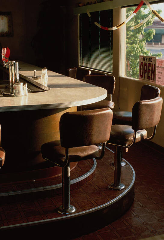 Shadow Poster featuring the photograph Stools Along Bar Of Diner by David Zaitz