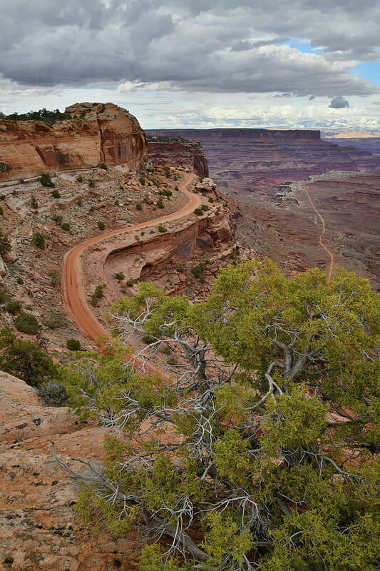 Canyonlands National Park Poster featuring the photograph Storm Clouds over Shafer Canyon in Canyonlands by Ray Mathis