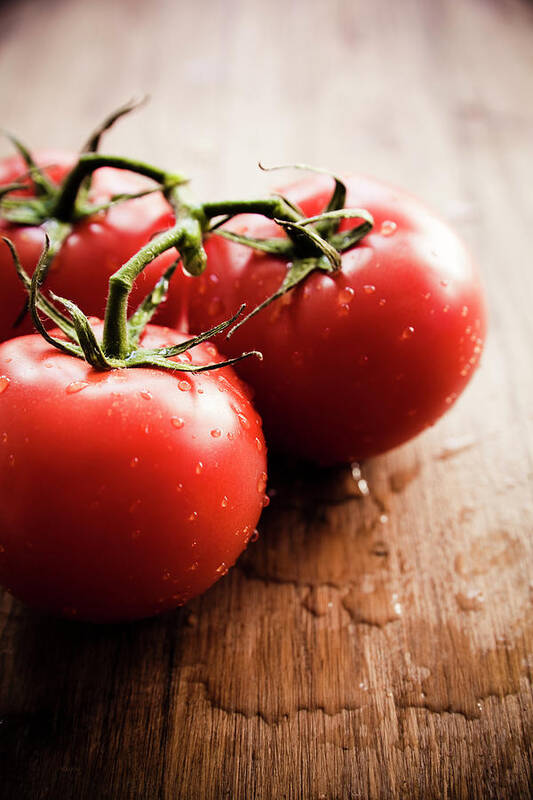 Bunch Poster featuring the photograph Tomatoes by Mmeemil