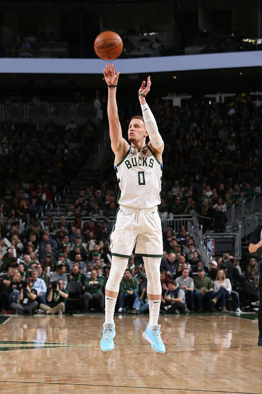 Donte Divincenzo Poster featuring the photograph New York Knicks v Milwaukee Bucks #11 by Gary Dineen