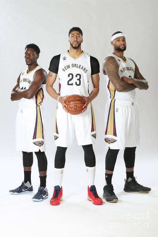 Jrue Holiday Poster featuring the photograph Demarcus Cousins, Jrue Holiday, and Anthony Davis #2 by Layne Murdoch